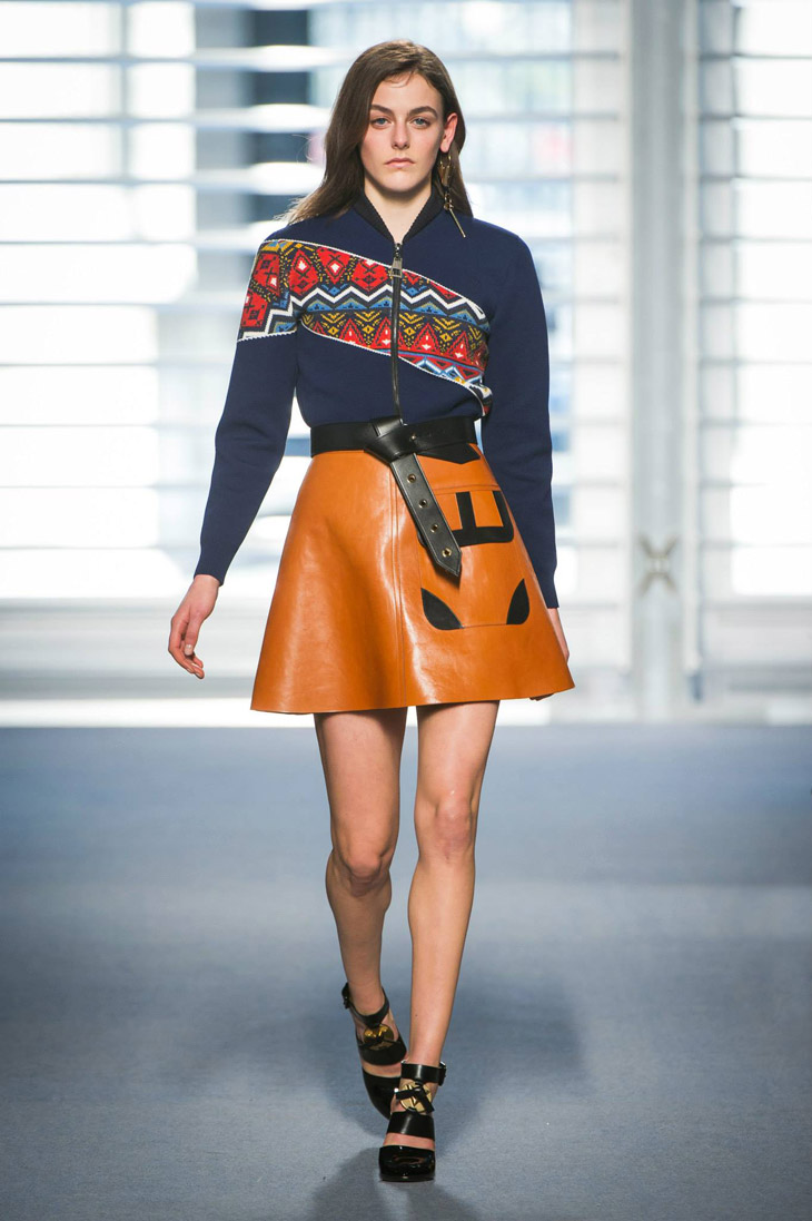 A model displays a creation by designer Nicolas Ghesquiere for Louis  Vuitton Fall-Winter 2014/2015 Ready-To-Wear collection show held at Cour  Carree du Louvre in Paris, France, on March 05, 2014. Photo by