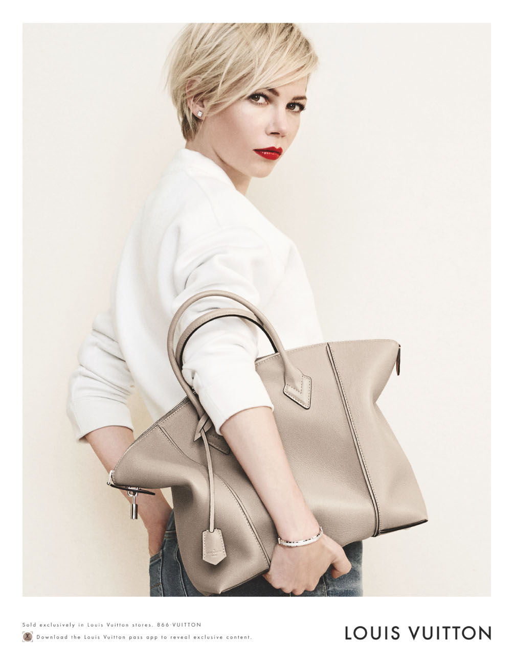 poster advertising Louis Vuitton handbag with Michelle Williams