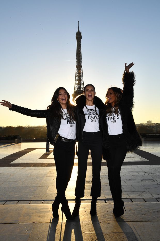 PARIS, FRANCE - NOVEMBER 29: Lily Aldridge, Adriana Lima and Jasmine Tookes pose in front of the Eiffel Tower prior the 2016 Victoria's Secret Fashion Show on November 29, 2016 in Paris, France. (Photo by Dimitrios Kambouris/Getty Images for Victoria's Secret)
