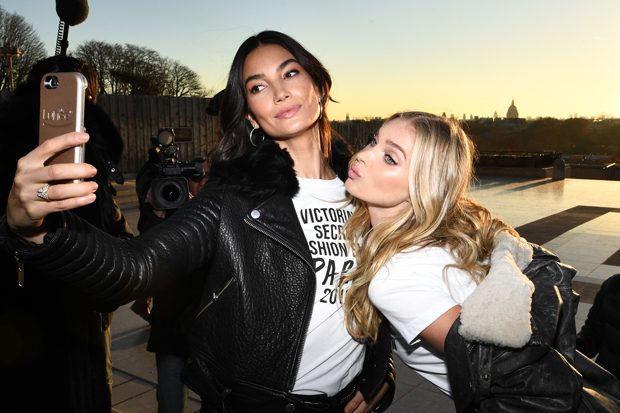 PARIS, FRANCE - NOVEMBER 29: Lily Aldridge and Elsa Hosk take a selfie in front of the Eiffel Tower prior the 2016 Victoria's Secret Fashion Show on November 29, 2016 in Paris, France. (Photo by Dimitrios Kambouris/Getty Images for Victoria's Secret)