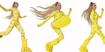 Paris Hilton Models MSCHF x Crocs Big Yellow Boots
