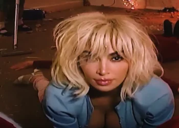 Kim Kardashian’s “Santa Baby” Video Is a Festive Fever Dream